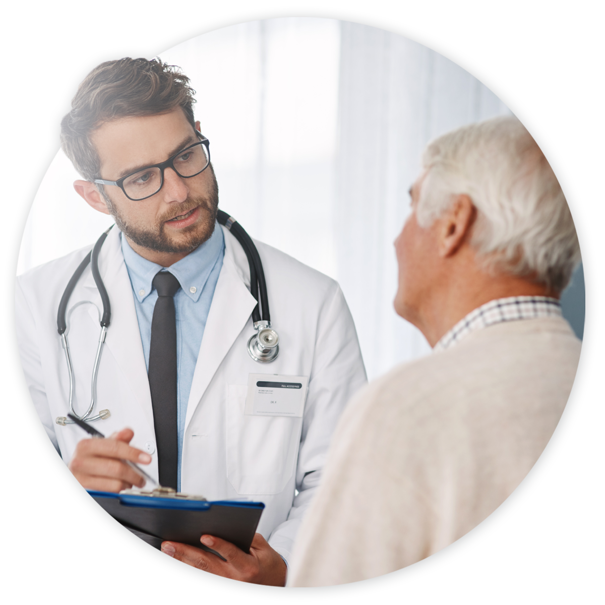 Urologist talking with older, male patient